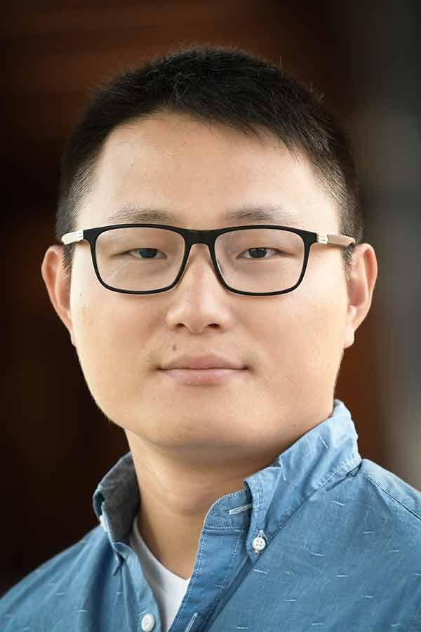 Professional headshot of Dr. Yang Yang.
